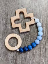 Load image into Gallery viewer, Rosary teething strand in blue ombre with wooden cross and ring teethers
